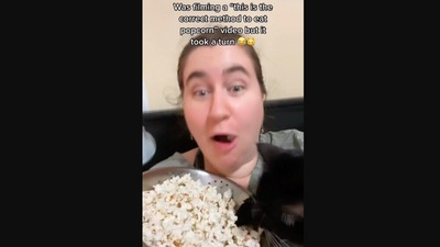 The image, taken from the Instagram video, shows the woman recording a video when she was interrupted by her cat. (TikTok/@katetattersall)