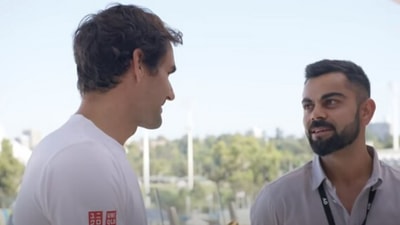 Roger Federer (L) with Virat Kohli (YouTube) Roger Federer (L) with Virat Kohli (YouTube)