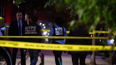New York Police Department (NYPD) officers investigate a crime scene. (Bloomberg/Representational image) New York Police Department (NYPD) officers investigate a crime scene. (Bloomberg/Representational image)