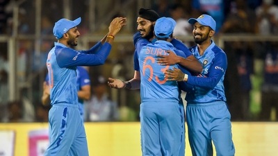 Arshdeep Singh with teammates in 1st T20I (PTI) Arshdeep Singh with teammates in 1st T20I (PTI)