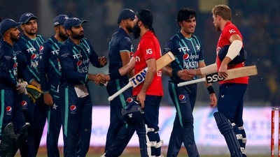 England's Moeen Ali, third right, and David Walley, right, shake hand with Pakistani players on the end of the fifth T20I. (AP)