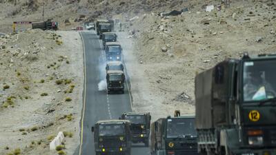 Indian army vehicles move in a convoy in the cold desert region of Ladakh, India. (AP) Indian army vehicles move in a convoy in the cold desert region of Ladakh, India. (AP)