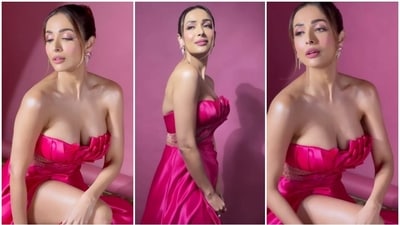 Malaika Arora poses for a photoshoot in a strapless hot pink gown. (Instagram) Malaika Arora poses for a photoshoot in a strapless hot pink gown. (Instagram)