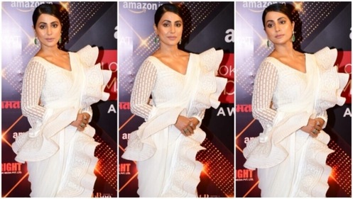 Hina Khan striking jewellery pieces with the white ruffled saree. (HT Photo/Varinder Chawla) Hina Khan striking jewellery pieces with the white ruffled saree. (HT Photo/Varinder Chawla)