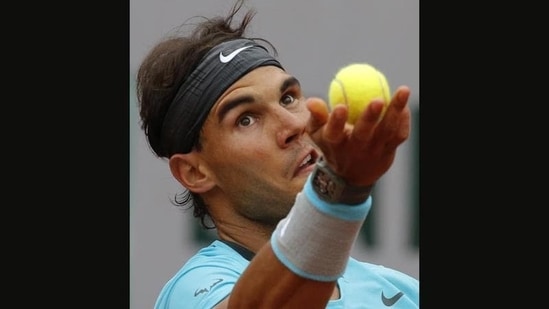 Spain's Rafael Nadal serves to Robby Ginepri of the U.S. during the first round match of the French Open tennis tournament at the Roland Garros stadium, in Paris(AP Photo/Michel Spingler)