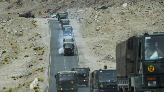 Indian army vehicles move in a convoy in the cold desert region of Ladakh, India. (AP)