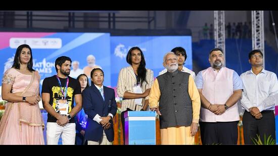 Prime Minister Narendra Modi with PV Sindhu, Neeraj Chopra and others during inauguration of 36th National Games in Ahmedabad, Thursday (PIB)
