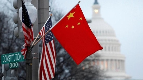 US-China Relations: The People's Republic of China flag and the US Stars and Stripes fly near the US Capitol in Washington, DC.(Reuters File)