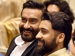 Ajay Devgn and Suriya at the 68th National Film Awards ceremony, at Vigyan Bhawan, in New Delhi. They both won the Best Actors trophy for Tanhaji and Soorarai Pottru.(Hindustan Times)
