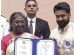 Suriya and Jyothika receiving awards at 68th National Film award. Suriya and Jyothika receiving awards at 68th National Film award.