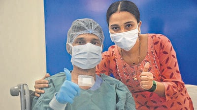 Thane, India - September 30, 2022: 39-year-old Bhikaji Nirgun, who underwent a heart transplant surgery, poses for the photos with his wife, at Jupiter Hospital, in Thane, Mumbai, India, on, Friday, September, 30, 2022. (Praful Gangurde/HT Photo) (HT PHOTO)
