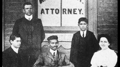 Gandhi (centre) with co-workers at his Johannesburg law office, six years after the Durban incident. (Courtesy National Gandhi Museum) Gandhi (centre) with co-workers at his Johannesburg law office, six years after the Durban incident. (Courtesy National Gandhi Museum)