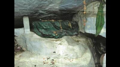The ‘shrouded’ rock that bears the inscription. (HT Photo) The ‘shrouded’ rock that bears the inscription. (HT Photo)