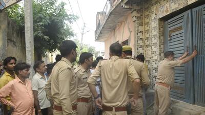 Police personnel outside the house in Ghaziabad’s Nandgram where the double murder took place on Friday. (Sakib Ali/ HT) Police personnel outside the house in Ghaziabad’s Nandgram where the double murder took place on Friday. (Sakib Ali/ HT)