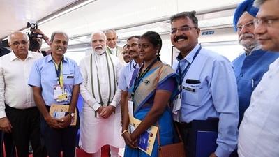 Prime Minister Narendra Modi with other passengers on board while taking a ride in the Vande Bharat Express. (ANI) Prime Minister Narendra Modi with other passengers on board while taking a ride in the Vande Bharat Express. (ANI)