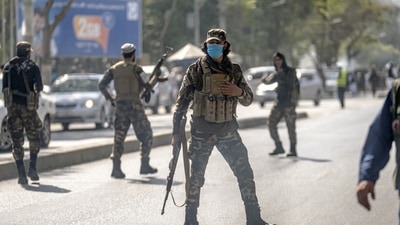 Taliban fighters stand guard at the explosion site, near a mosque, in Kabul, Afghanistan, September 23.&nbsp; (Representational image/ AP)