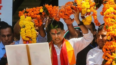 Jaipur: Senior Congress leader and former Rajasthan deputy chief minister Sachin Pilot being garlanded by supporters during his 45th birthday celebrations, outside his residence in Jaipur, Tuesday, Sept. 6, 2022. (PTI Photo) Jaipur: Senior Congress leader and former Rajasthan deputy chief minister Sachin Pilot being garlanded by supporters during his 45th birthday celebrations, outside his residence in Jaipur, Tuesday, Sept. 6, 2022. (PTI Photo)