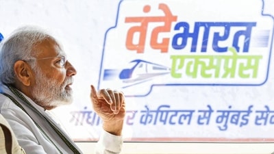 Prime Minister Narendra Modi rides the Vande Bharat Express train after flagging it off. (PTI) Prime Minister Narendra Modi rides the Vande Bharat Express train after flagging it off. (PTI)