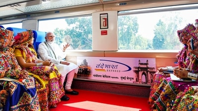The train will provide passengers aircraft-like travelling experience and advanced safety features, including Kavach technology, an indigenously developed Train Collision Avoidance System, PM Modi said. (PTI) The train will provide passengers aircraft-like travelling experience and advanced safety features, including Kavach technology, an indigenously developed Train Collision Avoidance System, PM Modi said. (PTI)
