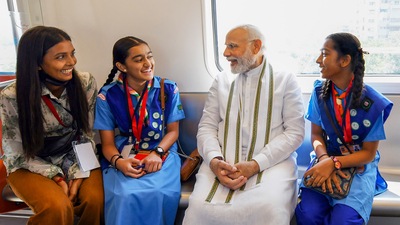 Prime Minister Narendra Modi interacts with students during his ride in a Metro after inaugurating the phase-1 of the Ahmedabad Metro rail project between Thaltej and Vastral, in Ahmedabad. (PTI) Prime Minister Narendra Modi interacts with students during his ride in a Metro after inaugurating the phase-1 of the Ahmedabad Metro rail project between Thaltej and Vastral, in Ahmedabad. (PTI)