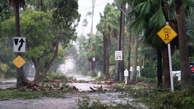 Hurricane Ian carved a path of destruction across central Florida that left rescue crews racing to reach trapped residents along the state's Gulf Coast. Ian barreled north on Friday toward a second landfall in South Carolina. (Getty Images via AFP) Hurricane Ian carved a path of destruction across central Florida that left rescue crews racing to reach trapped residents along the state's Gulf Coast. Ian barreled north on Friday toward a second landfall in South Carolina. (Getty Images via AFP)