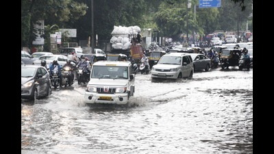 Waterlogging at Mitra Mandal Chowk after heavy rainfall in Pune on Friday. (HT PHOTO) Waterlogging at Mitra Mandal Chowk after heavy rainfall in Pune on Friday. (HT PHOTO)