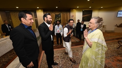 Ajay Devgn and Asha Parekh greet each other at the ceremony. Ajay Devgn and Asha Parekh greet each other at the ceremony.