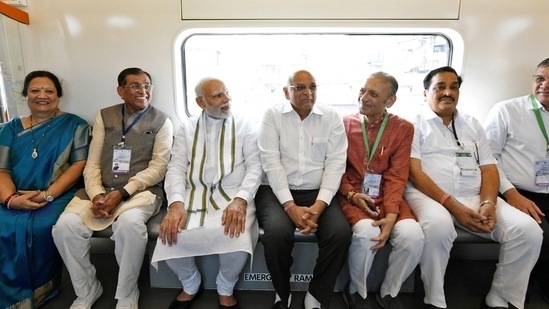 In the photographs attached with the tweet, PM Modi can be seen interacting with the railway officials, women entrepreneurs and others on board.(ANI/ PIB)