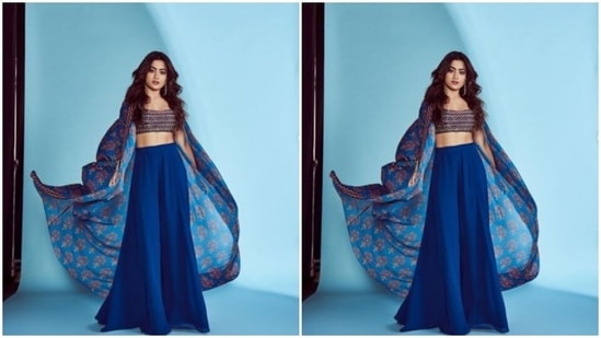 Rashmika played muse to fashion designer house DiyaRajvvir and picked a bright blue ensemble for the pictures.(Instagram/@rashmika_mandanna)
