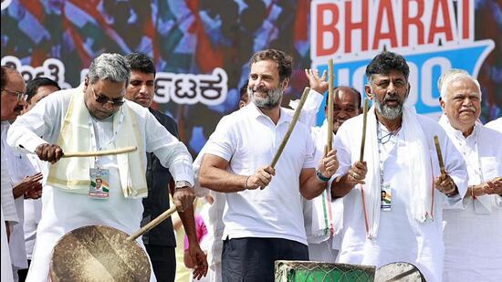 Leader of Opposition in Karnataka assembly Siddaramaiah, Congress leader Rahul Gandhi and state party chief DK Shivakumar during a function at the party's Bharat Jodo Yatra, at Gundlupet, in Chamarajanagar on Friday. (ANI)