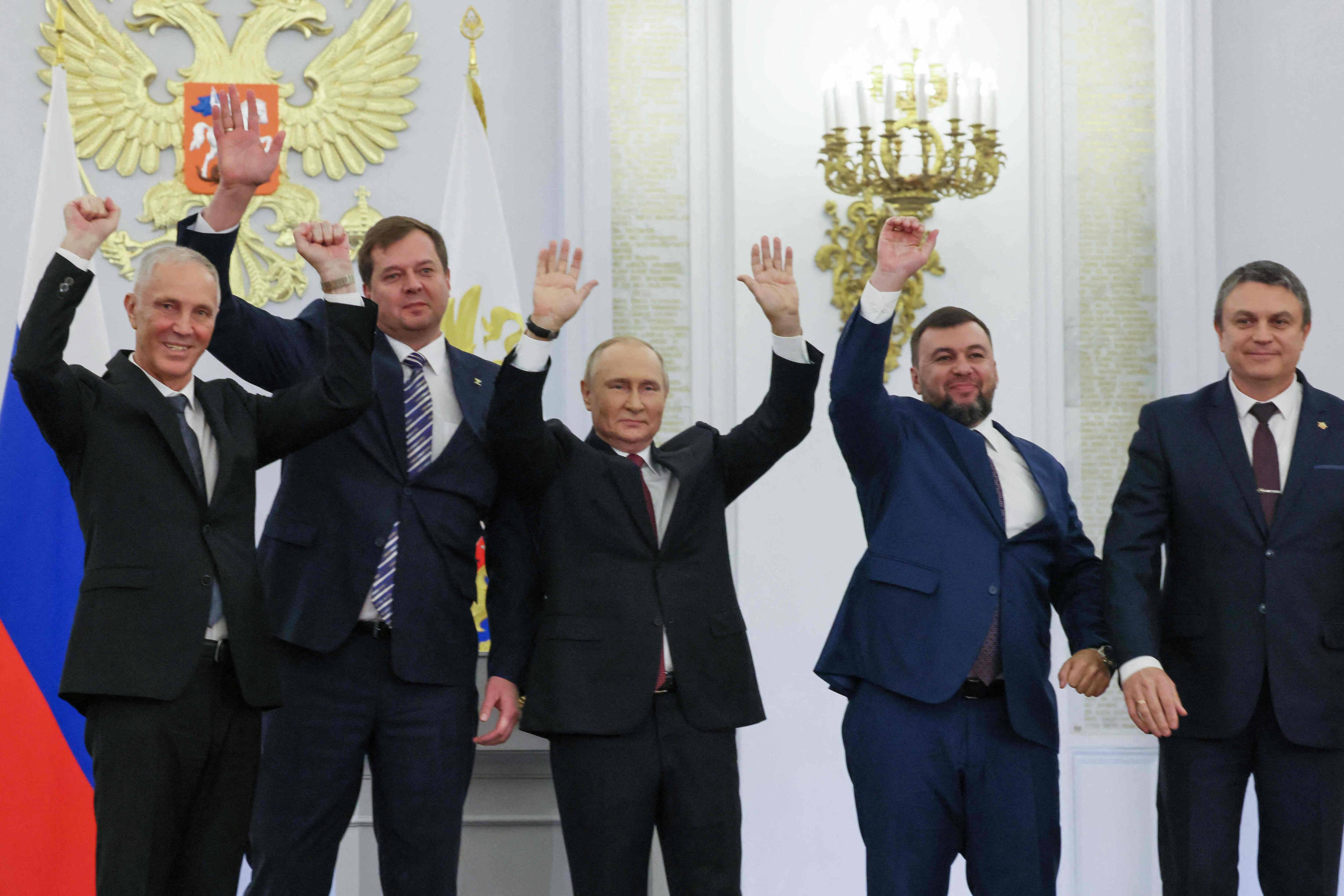 The Moscow-appointed heads of the newly annexed Ukraine regions with Russian President Vladimir Putin (centre), at the Kremlin in Moscow on September 30, 2022. (Photo by Mikhail METZEL/SPUTNIK/AFP) The Moscow-appointed heads of the newly annexed Ukraine regions with Russian President Vladimir Putin (centre), at the Kremlin in Moscow on September 30, 2022. (Photo by Mikhail METZEL/SPUTNIK/AFP)