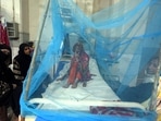 A Pakistani patient suffering from dengue fever, a mosquito-borne disease, is treated in an isolation ward, at a hospital in Karachi.(AP) A Pakistani patient suffering from dengue fever, a mosquito-borne disease, is treated in an isolation ward, at a hospital in Karachi.(AP)