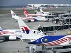 Malaysia Airlines planes taxi at a terminal while taking passengers at Kuala Lumpur International Airport in Sepang, Malaysia. The US Federal Aviation Administration has upgraded Malaysia's air safety rating to Category 1, allowing the country's carriers to expand flights to the United States after a three-year hiatus, Transport Minister Wee Ka Siong said Saturday, Oct. 1.(AP Photo/Vincent Thian, File) Malaysia Airlines planes taxi at a terminal while taking passengers at Kuala Lumpur International Airport in Sepang, Malaysia. The US Federal Aviation Administration has upgraded Malaysia's air safety rating to Category 1, allowing the country's carriers to expand flights to the United States after a three-year hiatus, Transport Minister Wee Ka Siong said Saturday, Oct. 1.(AP Photo/Vincent Thian, File)