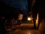 Hurricane Ian In Cuba: A street seller uses a lamp during a blackout in the aftermath of Hurricane Ian in Havana, Cuba.