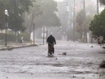Flood waters cover the street during Hurricane Ian. Flood waters cover the street during Hurricane Ian.