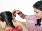 Navratri 2022: Top 5 hairstyles you must try this Navratri season(istockphoto) Navratri 2022: Top 5 hairstyles you must try this Navratri season(istockphoto)