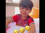 The toddler was crying while completing his homework(Twitter/@Gulzar_sahab) The toddler was crying while completing his homework(Twitter/@Gulzar_sahab)