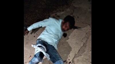 The injured criminal at the site of the shootout near Iradatganj trisection in Prayagraj. (Courtesy: Prayagraj police) The injured criminal at the site of the shootout near Iradatganj trisection in Prayagraj. (Courtesy: Prayagraj police)