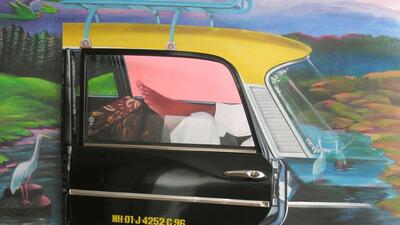 A snapshot of a lone taxi driver in repose, from artist Meera Devidayal’s collection, titled Tum Kab Aaoge, exhibited in 2005 in Mumbai.