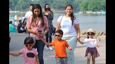 Visitors taking a stroll at Sukhna Lake in Chandigarh. After monsoon’s withdrawal, now humidity will gradually fall, making way for more comfortable weather, according to IMD. (Keshav Singh/HT)