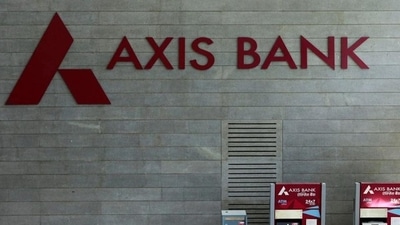 Axis Bank's logo is seen next to ATM machines at its corporate headquarters in Mumbai. (REUTERS Photo) Axis Bank's logo is seen next to ATM machines at its corporate headquarters in Mumbai. (REUTERS Photo)