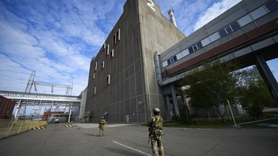 Russia-Ukraine War: Russian servicemen guard an area of the Zaporizhzhia Nuclear Power Station. (AP)