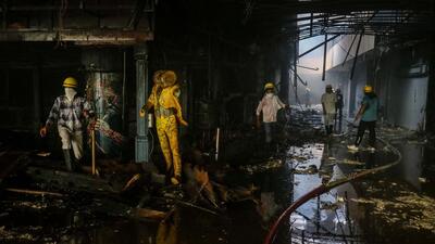 Gurugram, India - Oct. 1, 2022: Fire fighters douse the fire at Global Foyer Mall on Golf Course Road, in Gurugram, India, on Saturday, October 1, 2022. (Photo by Vipin Kumar/ Hindustan Times) (Hindustan Times)