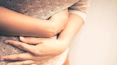 Changes in progesterone and estrogen levels during periods can cause the body to retain water and salt resulting in bloating. (Shutterstock)