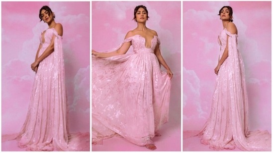 Mrunal Thakur has had a successful and fun-filled year with two back-to-back releases - Jersey and Sita Ramam, which received a lot of love from movie-goers. In response to all the positive responses from her fans, the Love Sonia actor often treats her well-wishers with beautiful photos of herself in designer couture. In her recent Instagram stills, Mrunal can be seen casting a spell on her fans with stunning pictures of herself in a fairytale pink gown.(Instagram/@mrunalthakur)