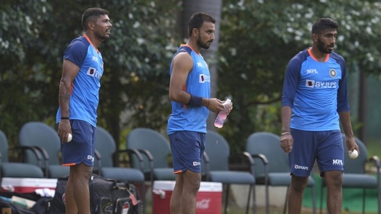Jasprit Bumrah, Harshal Patel, and Umesh Yadav during a practice session (AP)