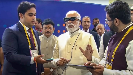 New Delhi: Prime Minister Narendra Modi with Akash Ambani, son of businessman Mukesh Ambani, during the inauguration of the 6th India Mobile Congress at Pragati Maidan in New Delhi, Saturday, Oct. 1, 2022. (PTI Photo)