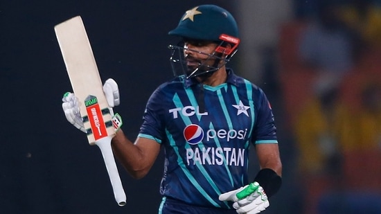 Babar Azam celebrates after scoring fifty during the sixth twenty20 cricket match between Pakistan and England(AP)