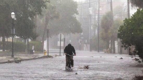 Flood waters cover the street during Hurricane Ian.(AP) Flood waters cover the street during Hurricane Ian.(AP)