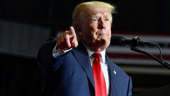 Former US president Donald Trump speaks during a rally.(Reuters)